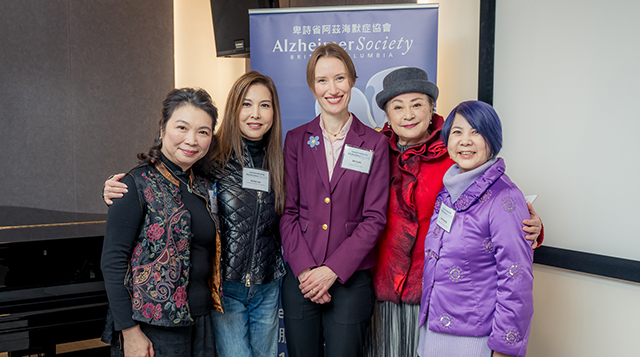 a group of people attending the charity dinner media conference