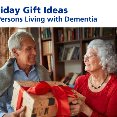A couple holding a gift with title, "Holiday gift ideas for persons living with dementia".