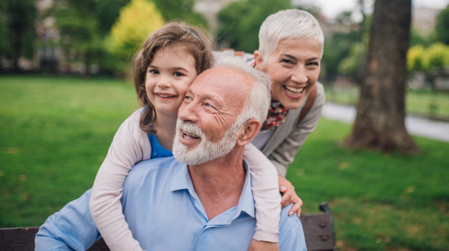 Man, woman, and child smiling
