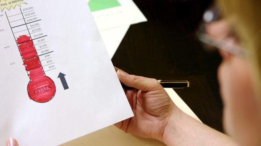 Paper with thermometer coloured in