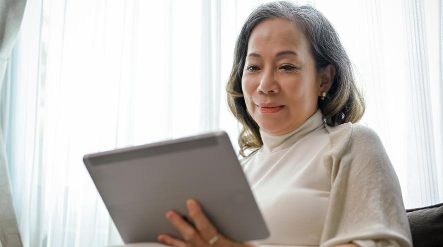 Woman uses tablet