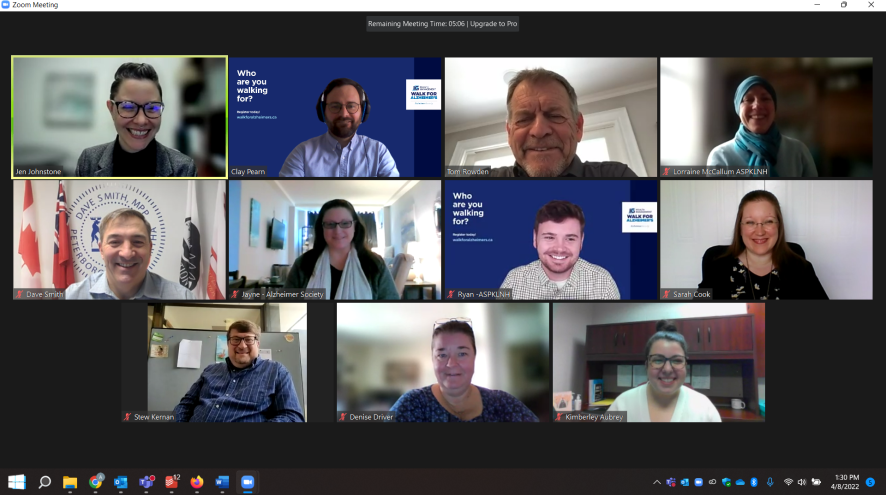 Eleven people smiling for a photo on Zoom