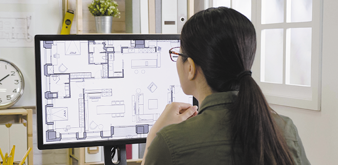 Woman looking at a computer screen