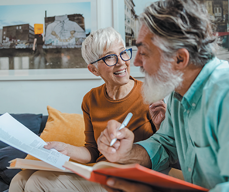 Two people sitting on a couch