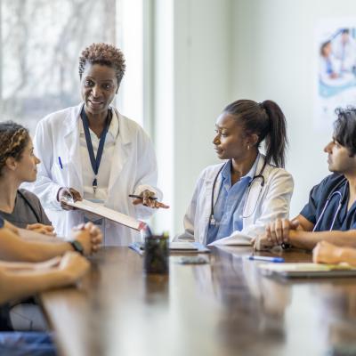 A group of doctors around a table