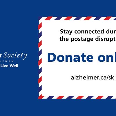 Text that says, "Stay connected during the postage disruption - Donate online" on top of an envelope.